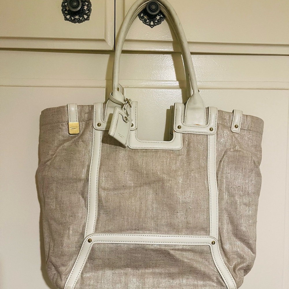 Authentic TUMI  Chic Beige and White Women's Tote Bag. 19 X 14 X 5 “ lovely bag